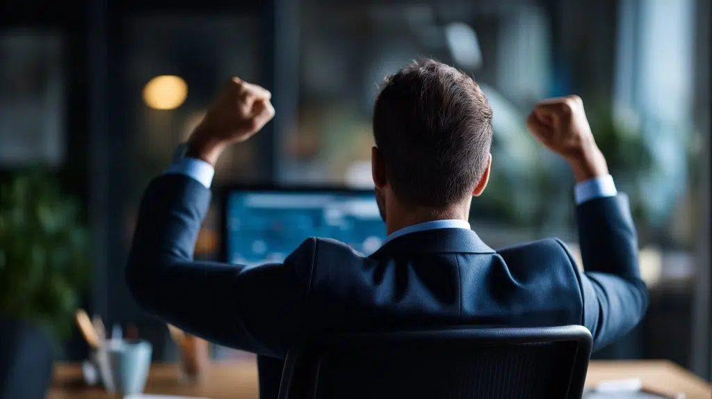 Sales leader celebrating results shown on a pipeline performance dashboard.